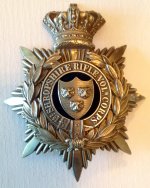 Helmet Plate 1st Shropshire Rifle Volunteer Corps.jpg Helmet Plate 1st Shropshire Rifle Volunteer Corps.jpg