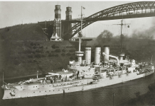 SMS Braunschweig passes the Levensau High Bridge.png