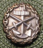 a silver navy wound badge Don D 1.jpg a silver navy wound badge Don D 1.jpg