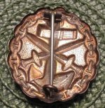 a silver navy wound badge Don D 2.jpg a silver navy wound badge Don D 2.jpg